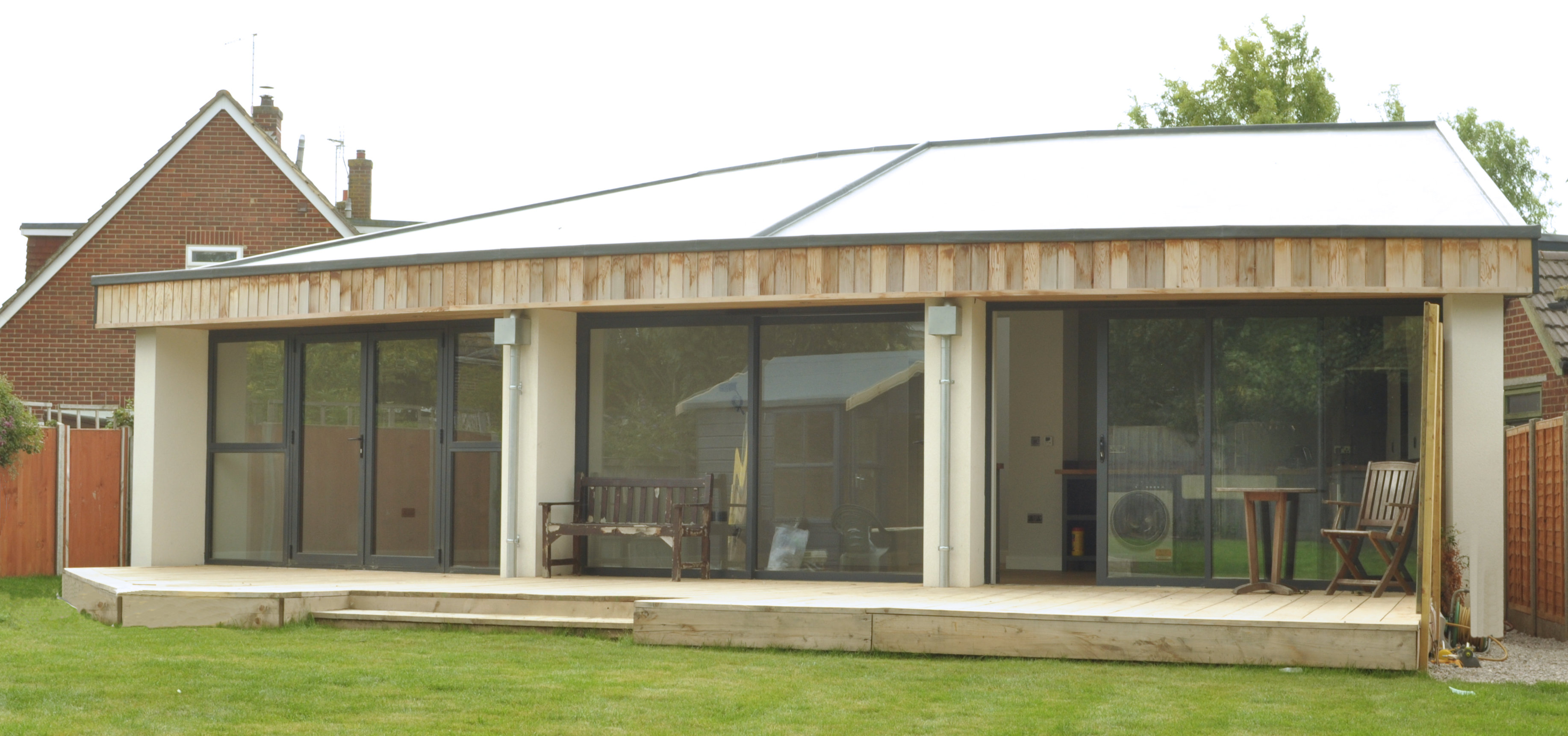 Fan shaped house with curved garden facade.   Design: Nick Baldry